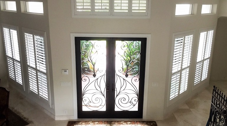 Philadelphia entryway white shutters